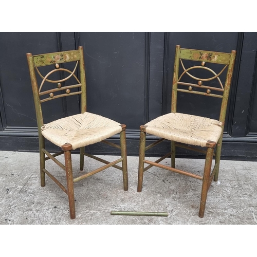 1078 - A pair of early 19th century green painted and rush seat occasional chairs, (s.d. to one).... 