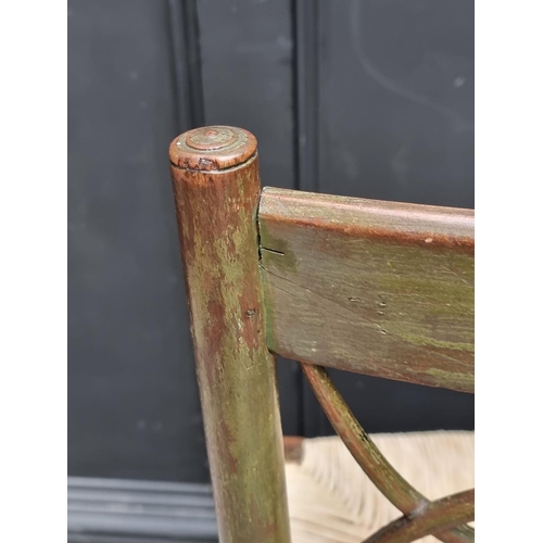 1078 - A pair of early 19th century green painted and rush seat occasional chairs, (s.d. to one).... 