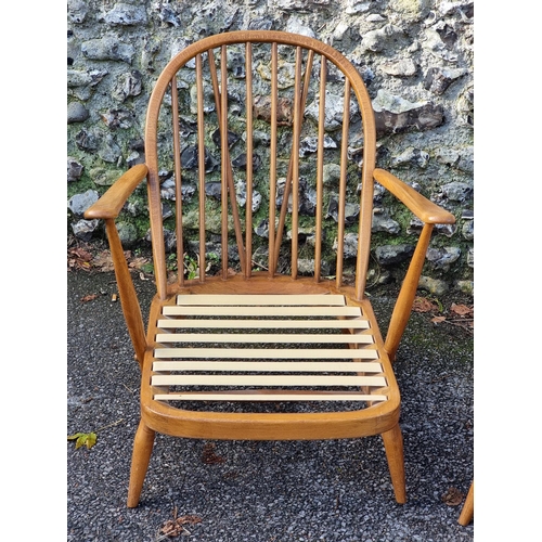 1082 - A pair of Ercol 203 Windsor armchairs.  