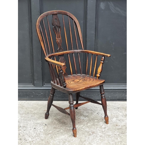 1086 - A 19th century ash and elm Windsor armchair.