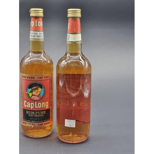 12 - Two old 70cl bottles of Cap Long Rum Pure, 54% abv, probably 1980s bottlings. (2)