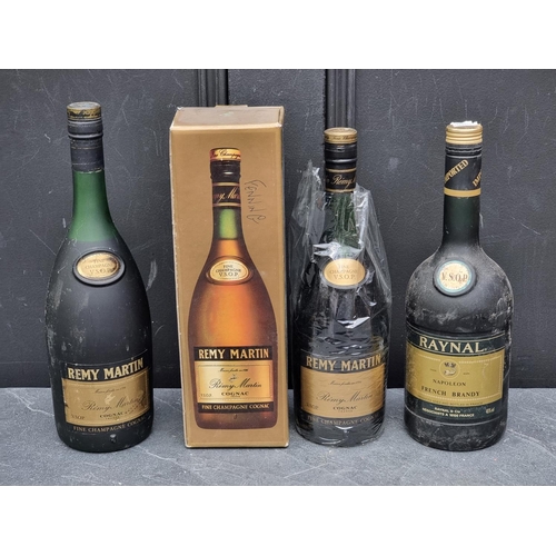 124 - Three bottles of Brandy, comprising: a 75cl Remy Martin VSOP Cognac, in card box; a 1 litre Remy Mar... 