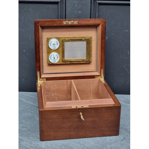 147 - A Dunhill walnut humidor, 25.5cm wide. 