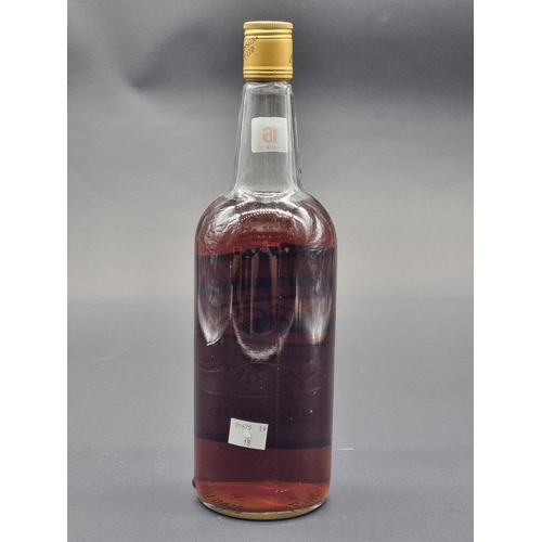 16 - A 1 litre bottle of Four Bells 'Finest Old' Navy Rum, 1970s bottling.