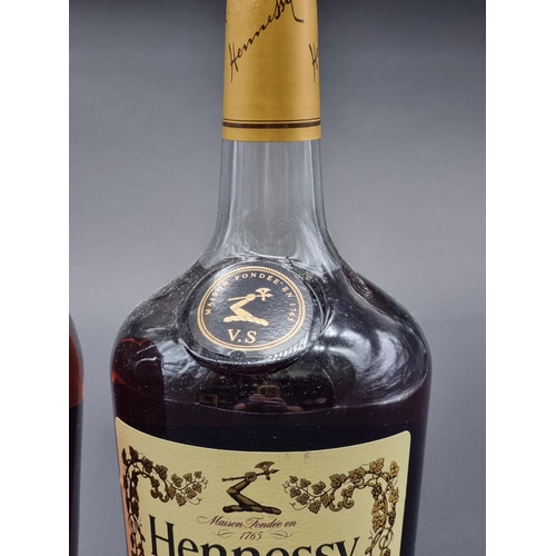 24 - Two 1 litre bottles of Cognac, comprising: Martell VS; and Hennessy VS. (2)