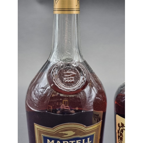 24 - Two 1 litre bottles of Cognac, comprising: Martell VS; and Hennessy VS. (2)