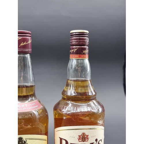 52 - Three 1 litre bottles of Bell's blended Whisky. (3)