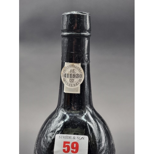 59 - A 75cl bottle of Graham's Malvedos 1986 Vintage Port.