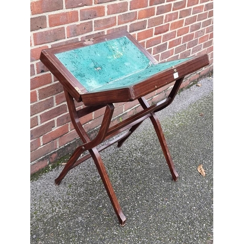 1025 - An early 20th century mahogany folding campaign desk, 61cm wide.