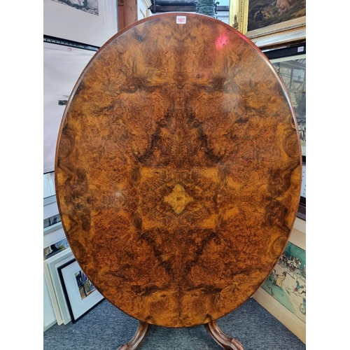 1027 - A good Victorian burr walnut oval loo table, 135cm wide.