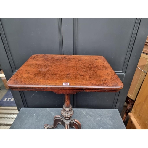 1030 - A Victorian burr walnut pedestal table, 60cm wide.