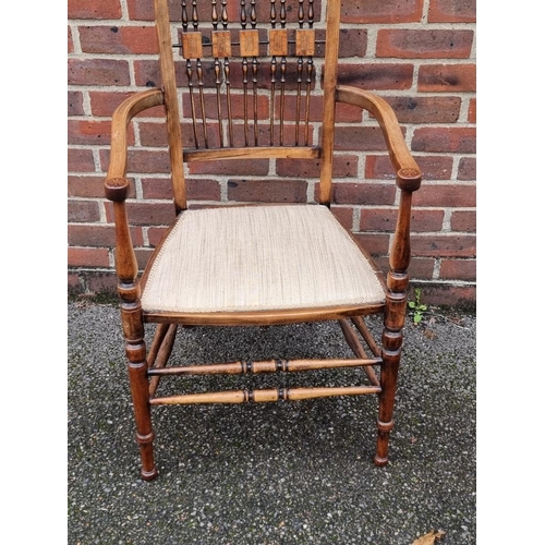 1087 - An Arts & Crafts style mahogany and inlaid open arm elbow chair.