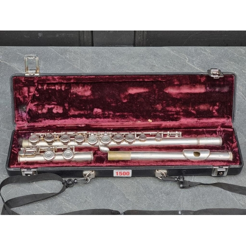 1500 - A chrome plated Buffet flute, in fitted case.