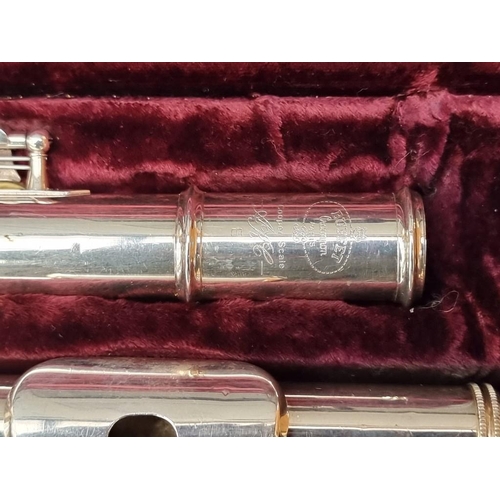 1500 - A chrome plated Buffet flute, in fitted case.