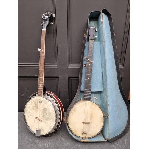 1501 - A Rally four string banjo; together with another banjo, in case. (2)