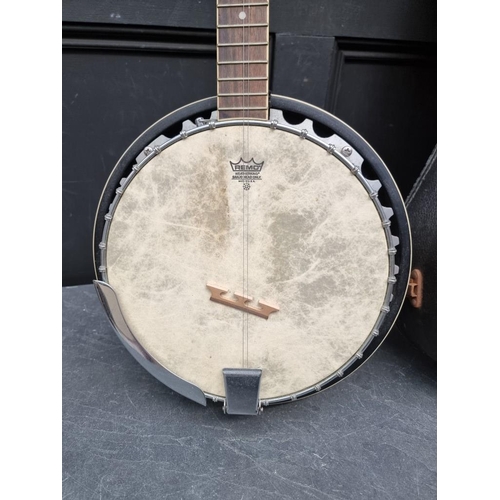 1501 - A Rally four string banjo; together with another banjo, in case. (2)