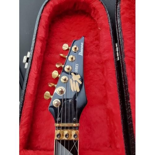 1502 - An Ibanez EX370/FTP electric guitar, in padded case.