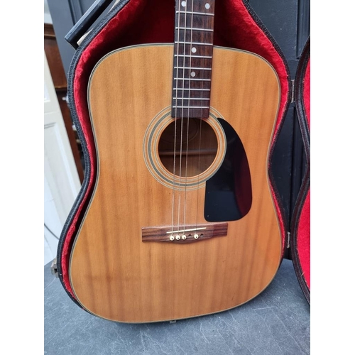 1504 - A Fender acoustic guitar, in padded case.