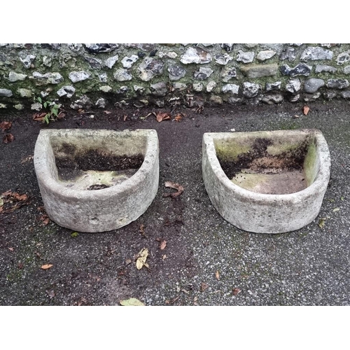 1543 - A pair of sandstone bowfronted troughs, 55 x 45.5cm.