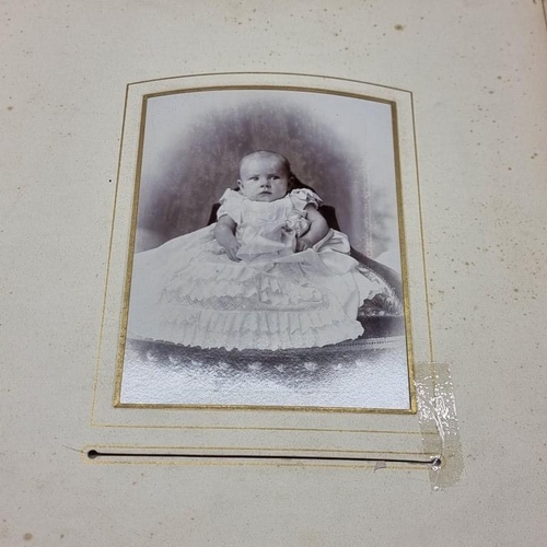 227 - CARTE DE VISITE: album of approx 225 CDV portraits, embossed brown morocco covers with metallic clos... 