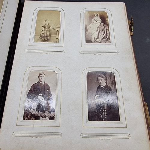 227 - CARTE DE VISITE: album of approx 225 CDV portraits, embossed brown morocco covers with metallic clos... 