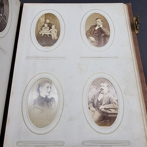 227 - CARTE DE VISITE: album of approx 225 CDV portraits, embossed brown morocco covers with metallic clos... 