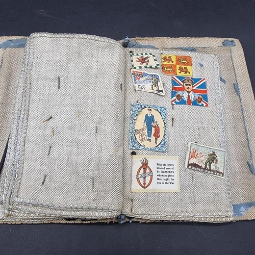 249 - WORLD WAR I CHARITY PINS: cloth album containing circa 100 paper, fabric and metallic charity p... 