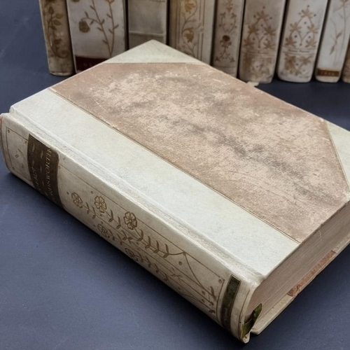 312 - VELLUM BINDINGS: a collection of 11 volumes in attractive decorative vellum bindings, late 19th... 