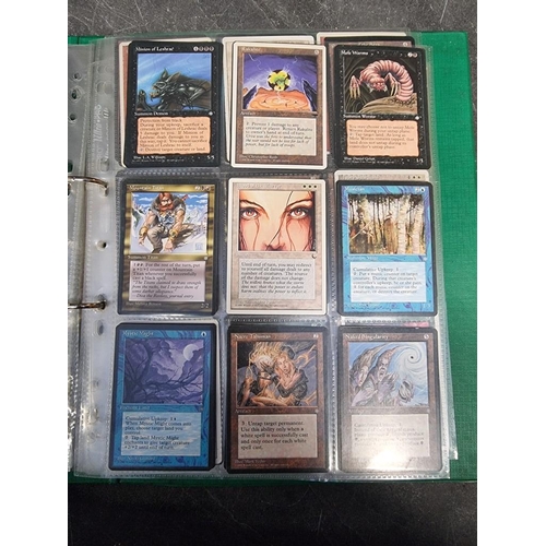 464 - MAGIC: The Gathering: collection of cards in album.