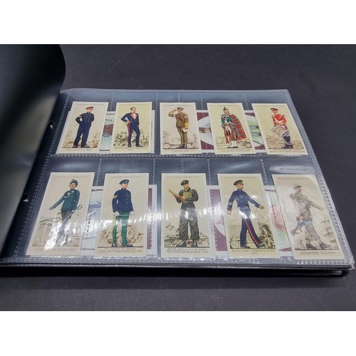 531 - CIGARETTE & TEA CARDS: a large collection, neatly arranged in 18 modern albums, to include ... 