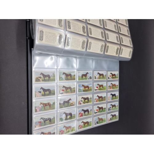 531 - CIGARETTE & TEA CARDS: a large collection, neatly arranged in 18 modern albums, to include ... 