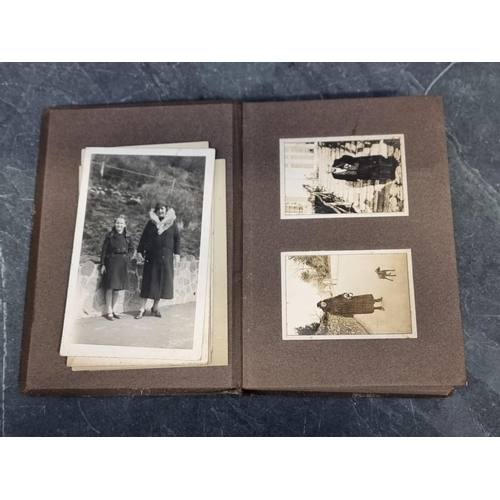 551 - PHOTOGRAPH ALBUMS, MAPS & MAGIC: a quantity in box, to include early c20 snapshot album of ... 