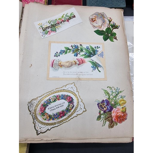 562 - SCRAP ALBUM: mid-19thc album, embossed burgundy card covers, spine gilt, rubbed and scuffed, 4t... 