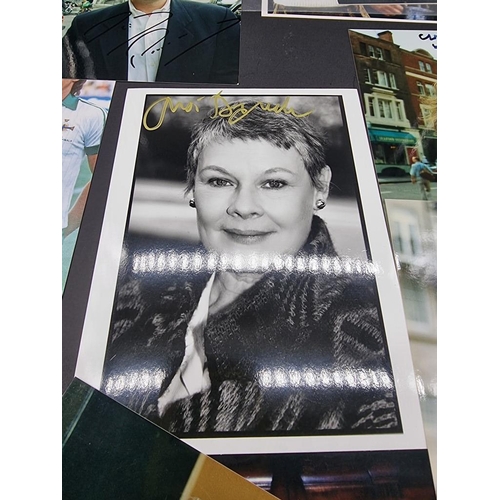 589 - AUTOGRAPHS: a similar lot, to include Judi Dench, Michael Palin, Sir Michael Parkinson and othe... 