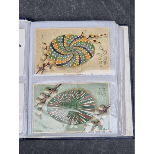 615 - POSTCARDS: collection of 55 in modern album, broad variety including 2 woven silk cards (HMT De... 