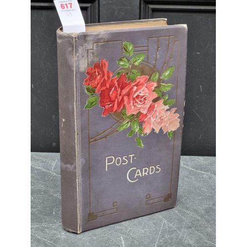 617 - POSTCARDS: a vintage album of cards, grey cloth covers with floral design to upper board. (Albu... 