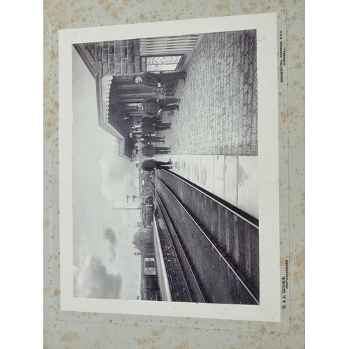 620 - CORNWALL: RAILWAYS: albumen print photograph of signalman in box at unidentified Cornish station by ... 