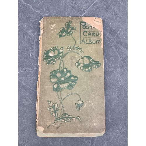 622 - POSTCARD ALBUM: vintage album of approx 120 postcards, mixed topography and greetings, some interest... 