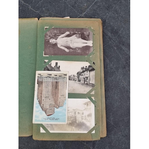 622 - POSTCARD ALBUM: vintage album of approx 120 postcards, mixed topography and greetings, some interest... 