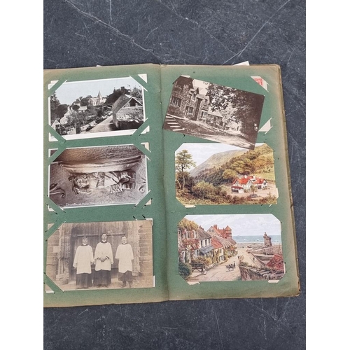 622 - POSTCARD ALBUM: vintage album of approx 120 postcards, mixed topography and greetings, some interest... 