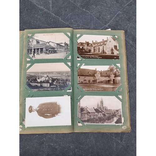 622 - POSTCARD ALBUM: vintage album of approx 120 postcards, mixed topography and greetings, some interest... 