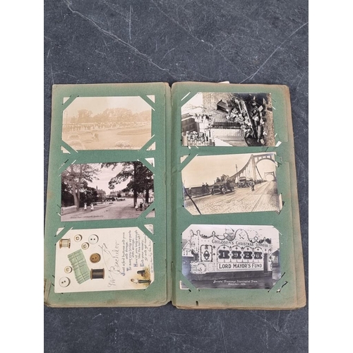 622 - POSTCARD ALBUM: vintage album of approx 120 postcards, mixed topography and greetings, some interest... 