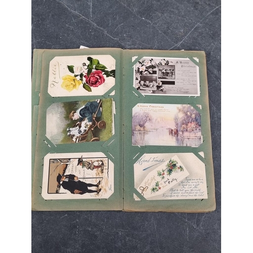 622 - POSTCARD ALBUM: vintage album of approx 120 postcards, mixed topography and greetings, some interest... 