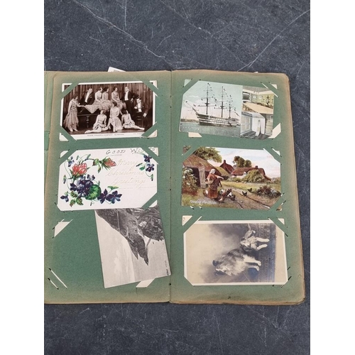 622 - POSTCARD ALBUM: vintage album of approx 120 postcards, mixed topography and greetings, some interest... 