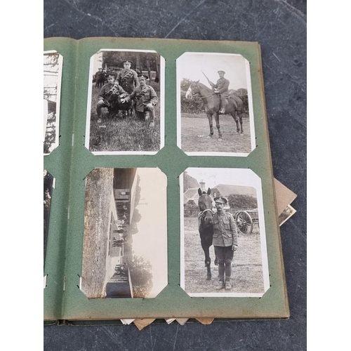 624 - POSTCARD ALBUM: large format album full, with others loosely inserted: to include WWI period mi... 