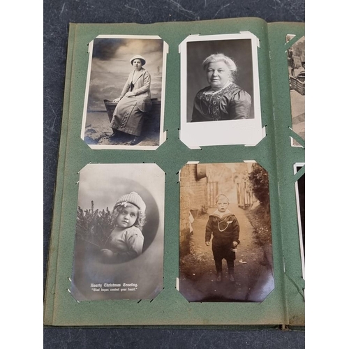 624 - POSTCARD ALBUM: large format album full, with others loosely inserted: to include WWI period mi... 