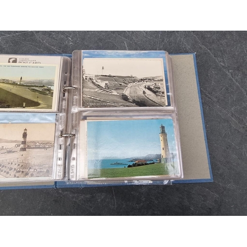 627 - POSTCARDS: LIGHTHOUSES: 3 albums of postcards, comprising 2 of lighthouses and one of piers and... 