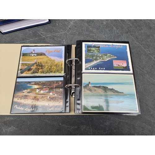 627 - POSTCARDS: LIGHTHOUSES: 3 albums of postcards, comprising 2 of lighthouses and one of piers and... 