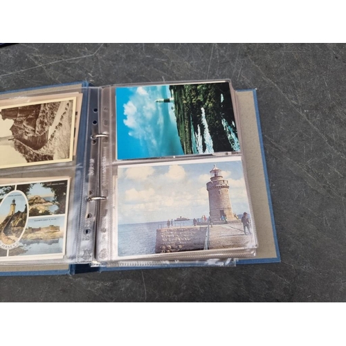 627 - POSTCARDS: LIGHTHOUSES: 3 albums of postcards, comprising 2 of lighthouses and one of piers and... 