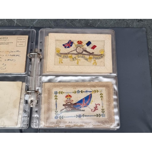 628 - MILITARY: small album containing 14 World War I period embroidered silk types, including 2nd Qu... 